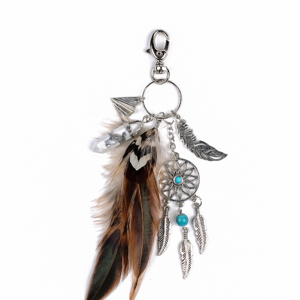 Pendentif porte-clés de voiture bohème attrape-rêves en plume et opale, alliage et métal.