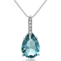 Collier pendentif en cristal bleu en forme de goutte d'eau et de poire.