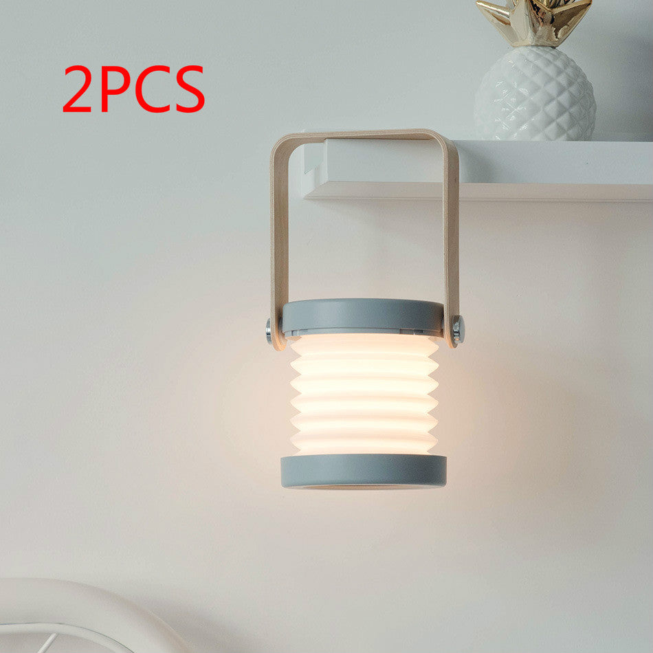 Lampe de nuit LED pliable, tactile et à intensité variable, rechargeable par USB, idéale pour la décoration intérieure.