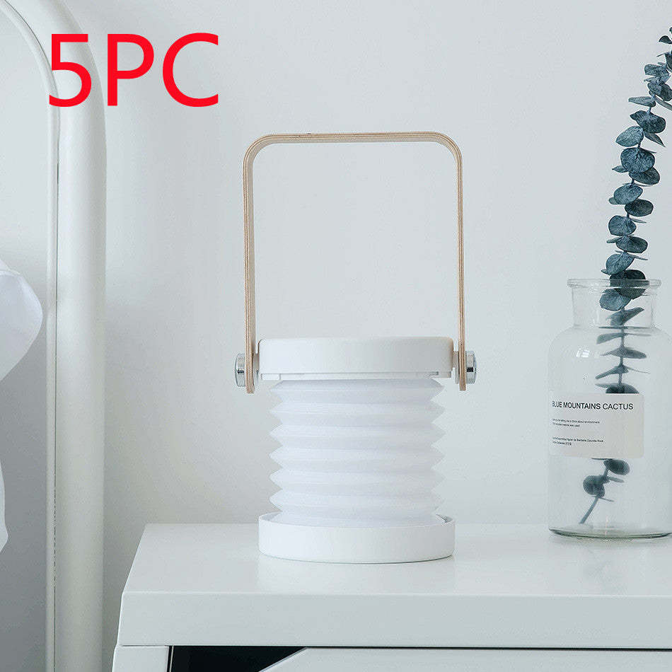 Lampe de nuit LED pliable, tactile et à intensité variable, rechargeable par USB, idéale pour la décoration intérieure.