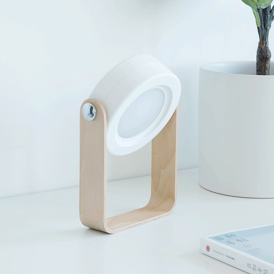Lampe de nuit LED pliable, tactile et à intensité variable, rechargeable par USB, idéale pour la décoration intérieure.