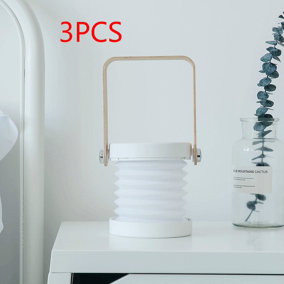 Lampe de nuit LED pliable, tactile et à intensité variable, rechargeable par USB, idéale pour la décoration intérieure.