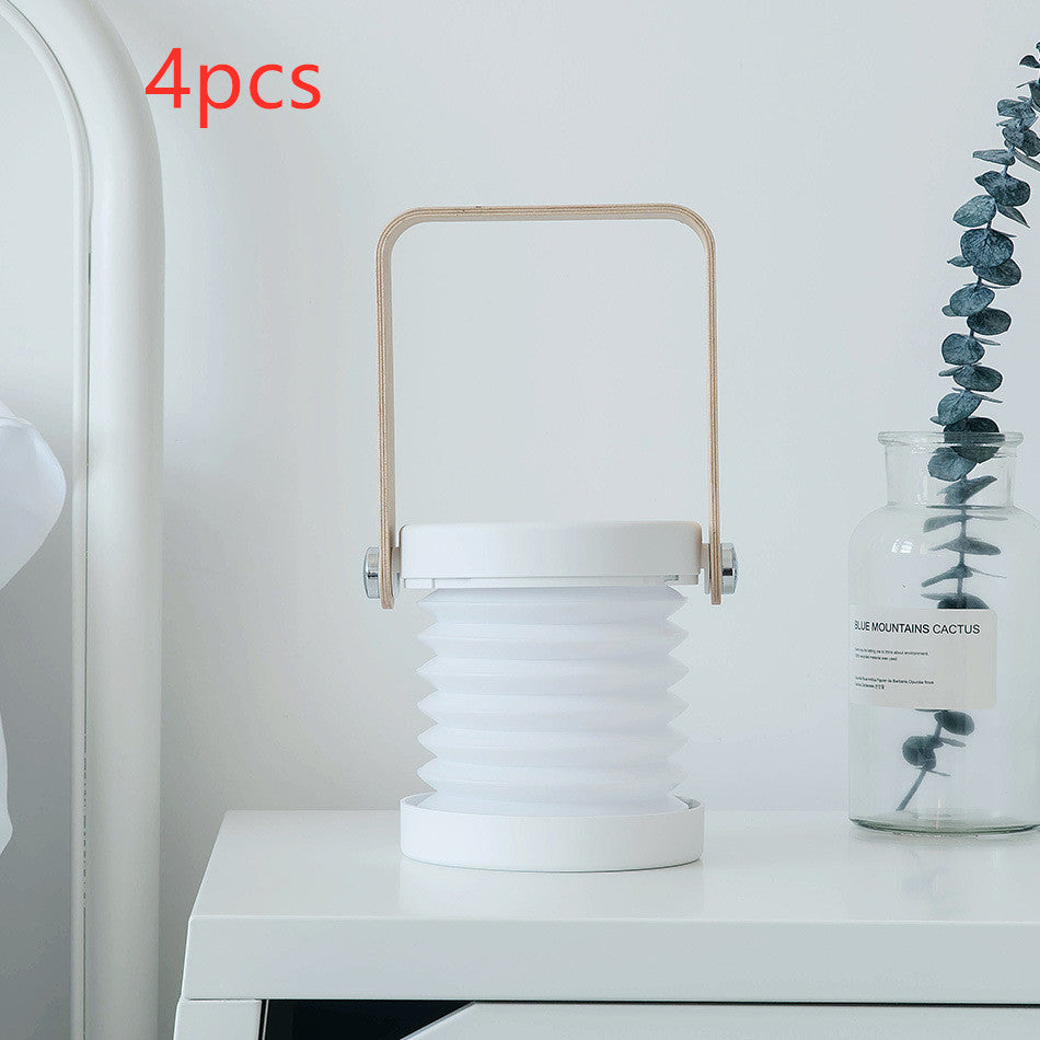 Lampe de nuit LED pliable, tactile et à intensité variable, rechargeable par USB, idéale pour la décoration intérieure.