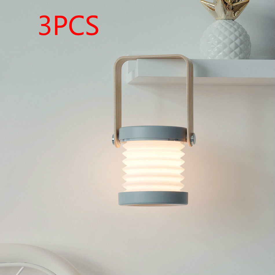 Lampe de nuit LED pliable, tactile et à intensité variable, rechargeable par USB, idéale pour la décoration intérieure.