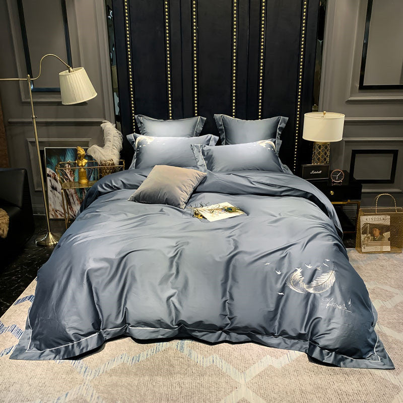 Parure de lit en coton égyptien soyeux et plumes de luxe