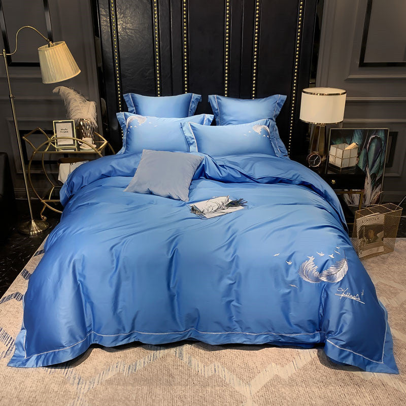 Parure de lit en coton égyptien soyeux et plumes de luxe