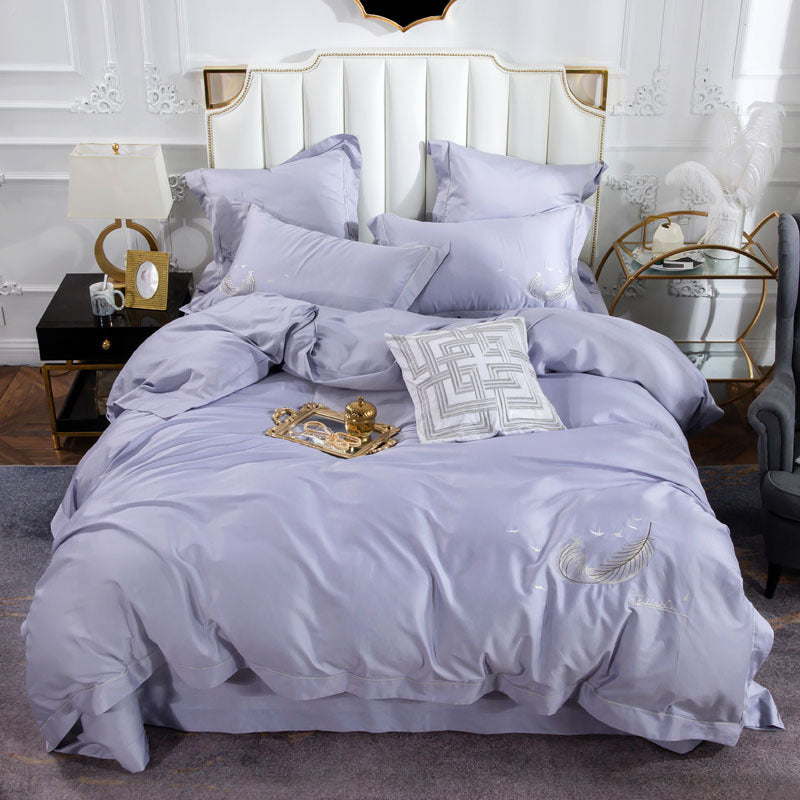 Parure de lit en coton égyptien soyeux et plumes de luxe