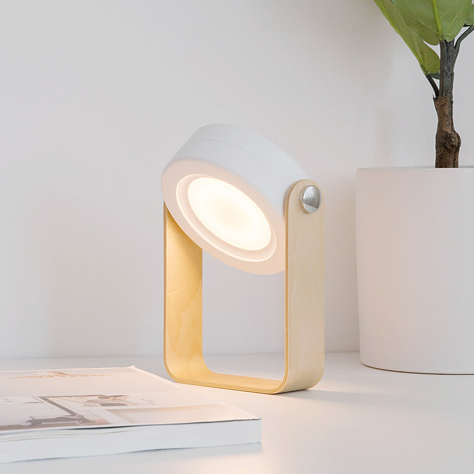 Lampe de nuit LED pliable, tactile et à intensité variable, rechargeable par USB, idéale pour la décoration intérieure.