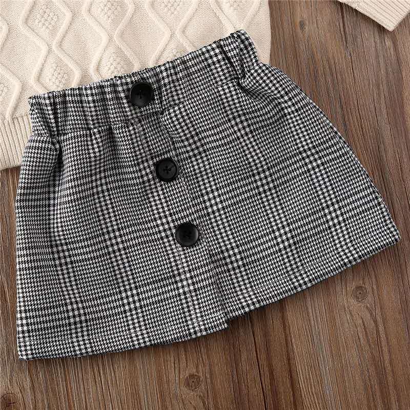 Ensemble fille - Pull col roulé et jupe à carreaux