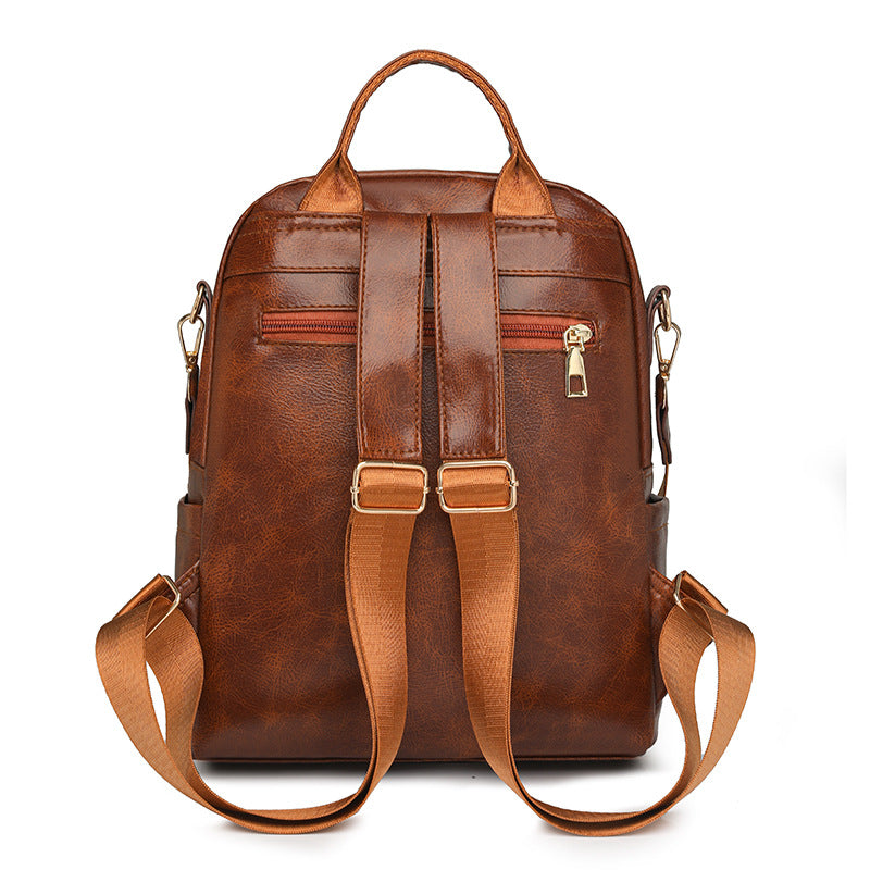 Sac à dos élégant pour femme, de couleur unie, idéal pour les trajets quotidiens et offrant une grande capacité.