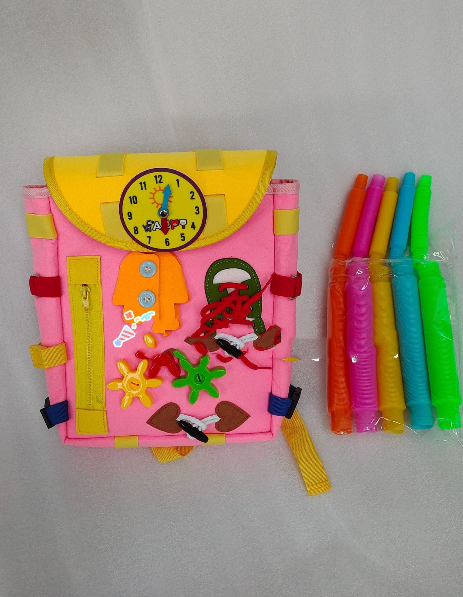 Sac à dos tableau d'activités pour tout-petits avec boucles et jouets d'éveil pour développer les compétences de base de la vie quotidienne