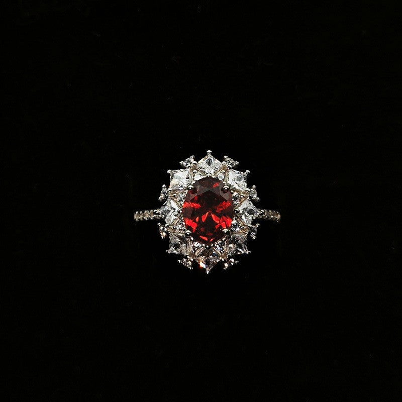 Bague en argent S925 avec ouverture ajustable ornée d'un zircon rouge sang de pigeon de haute qualité