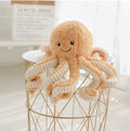 Bébé pieuvre en peluche
