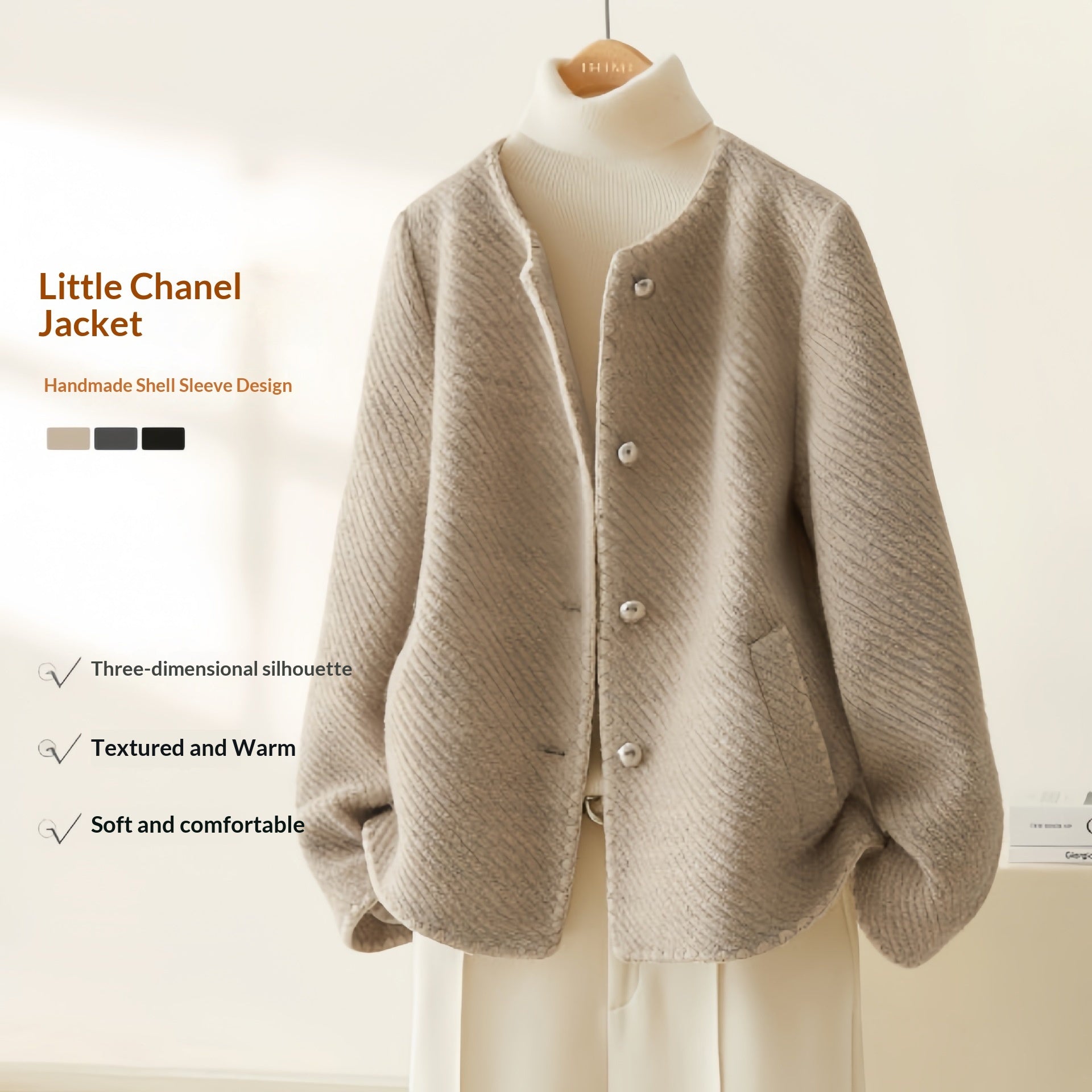 Manteau minimaliste luxueux en laine à manches coquille pour femme