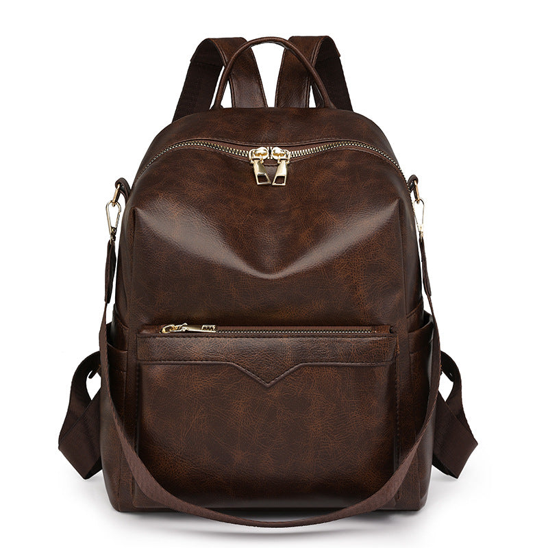 Sac à dos élégant pour femme, de couleur unie, idéal pour les trajets quotidiens et offrant une grande capacité.