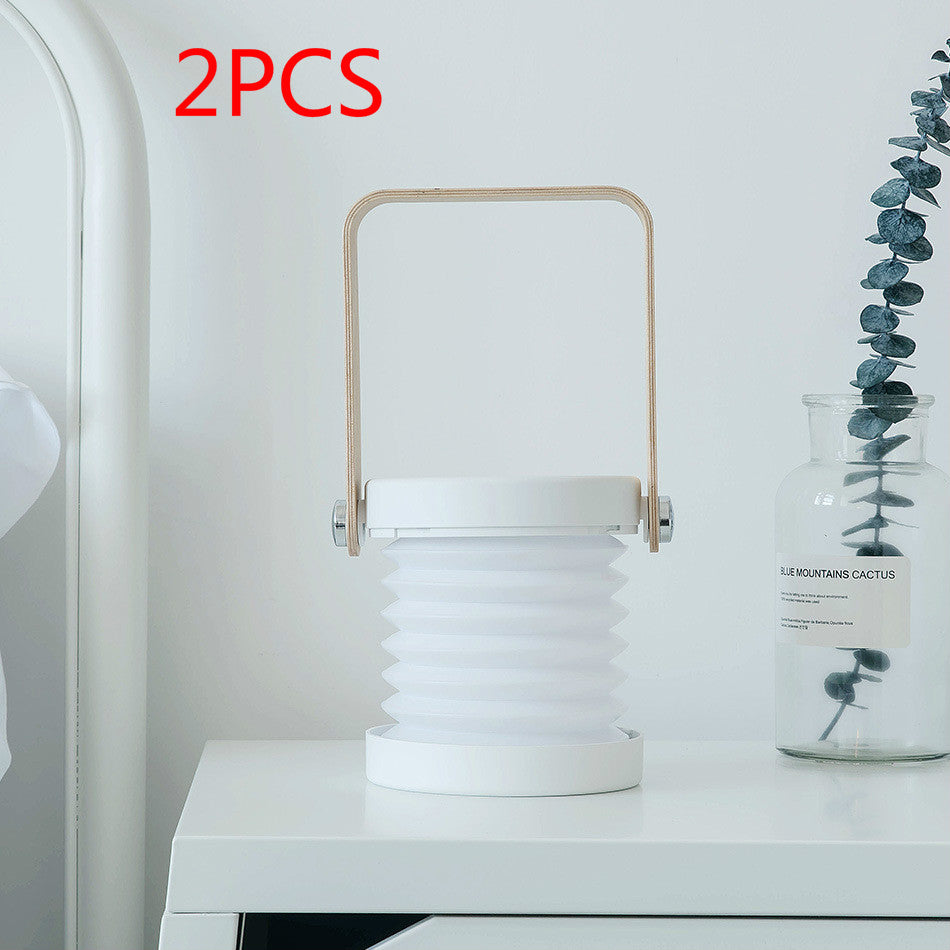 Lampe de nuit LED pliable, tactile et à intensité variable, rechargeable par USB, idéale pour la décoration intérieure.