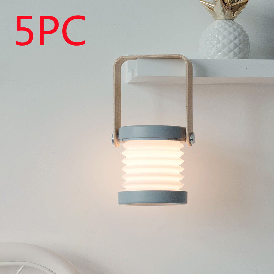 Lampe de nuit LED pliable, tactile et à intensité variable, rechargeable par USB, idéale pour la décoration intérieure.