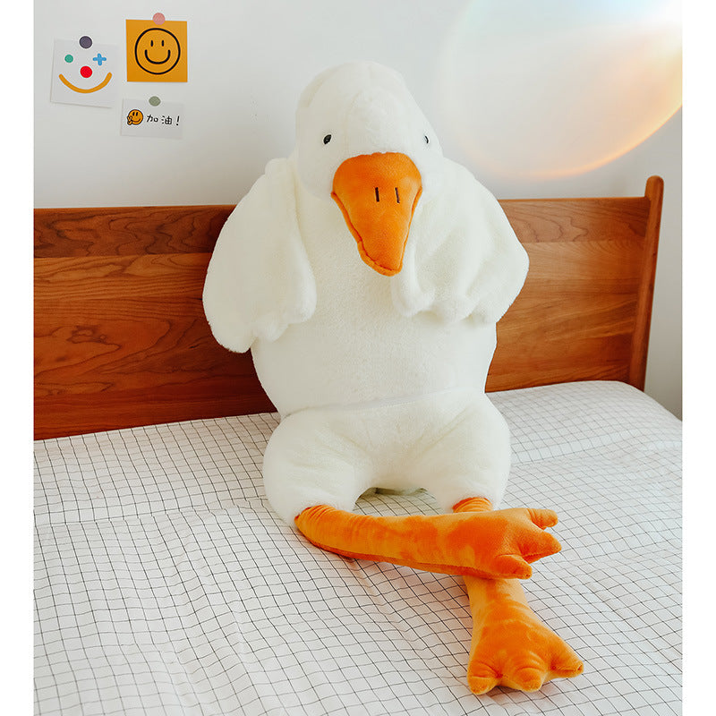 Coussin en peluche représentant une grosse oie blanche mignonne