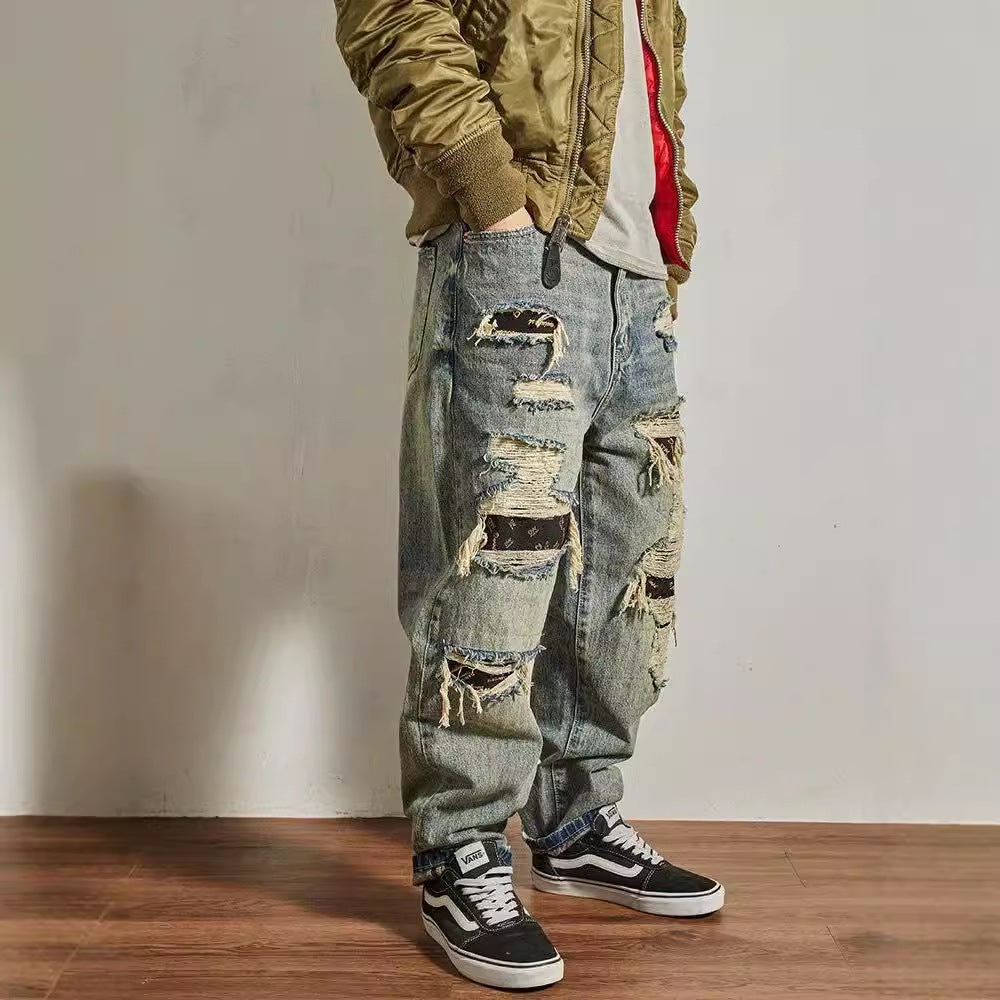 Jeans homme coupe droite ample et fuselée, effet usé et troué