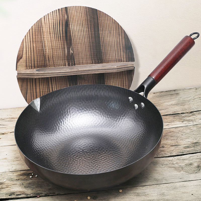 Poêle en fer traditionnelle, wok en fer fait main