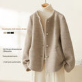 Manteau minimaliste luxueux en laine à manches coquille pour femme