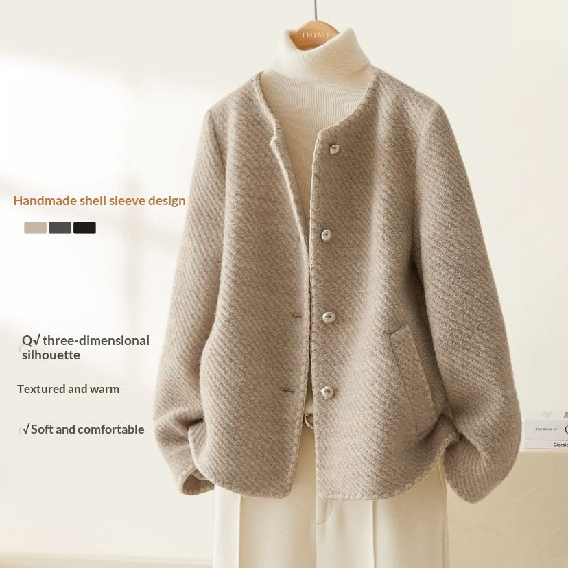 Manteau minimaliste luxueux en laine à manches coquille pour femme