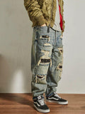 Jeans homme coupe droite ample et fuselée, effet usé et troué