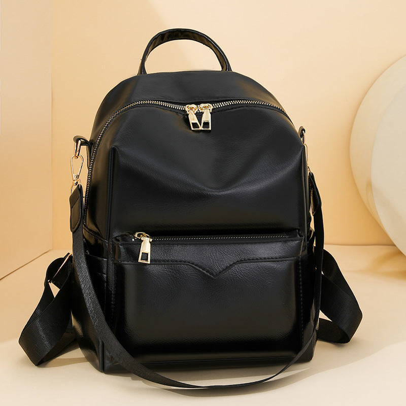 Sac à dos élégant pour femme, de couleur unie, idéal pour les trajets quotidiens et offrant une grande capacité.