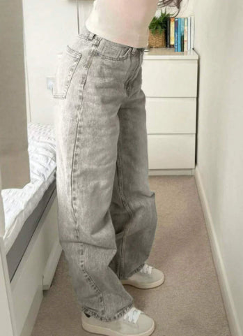 Pantalon ample à taille haute et jambes larges, coupe droite