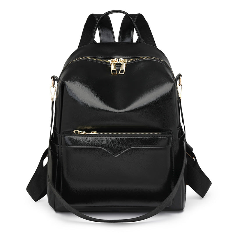 Sac à dos élégant pour femme, de couleur unie, idéal pour les trajets quotidiens et offrant une grande capacité.