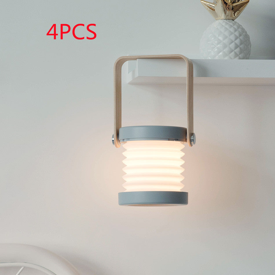 Lampe de nuit LED pliable, tactile et à intensité variable, rechargeable par USB, idéale pour la décoration intérieure.