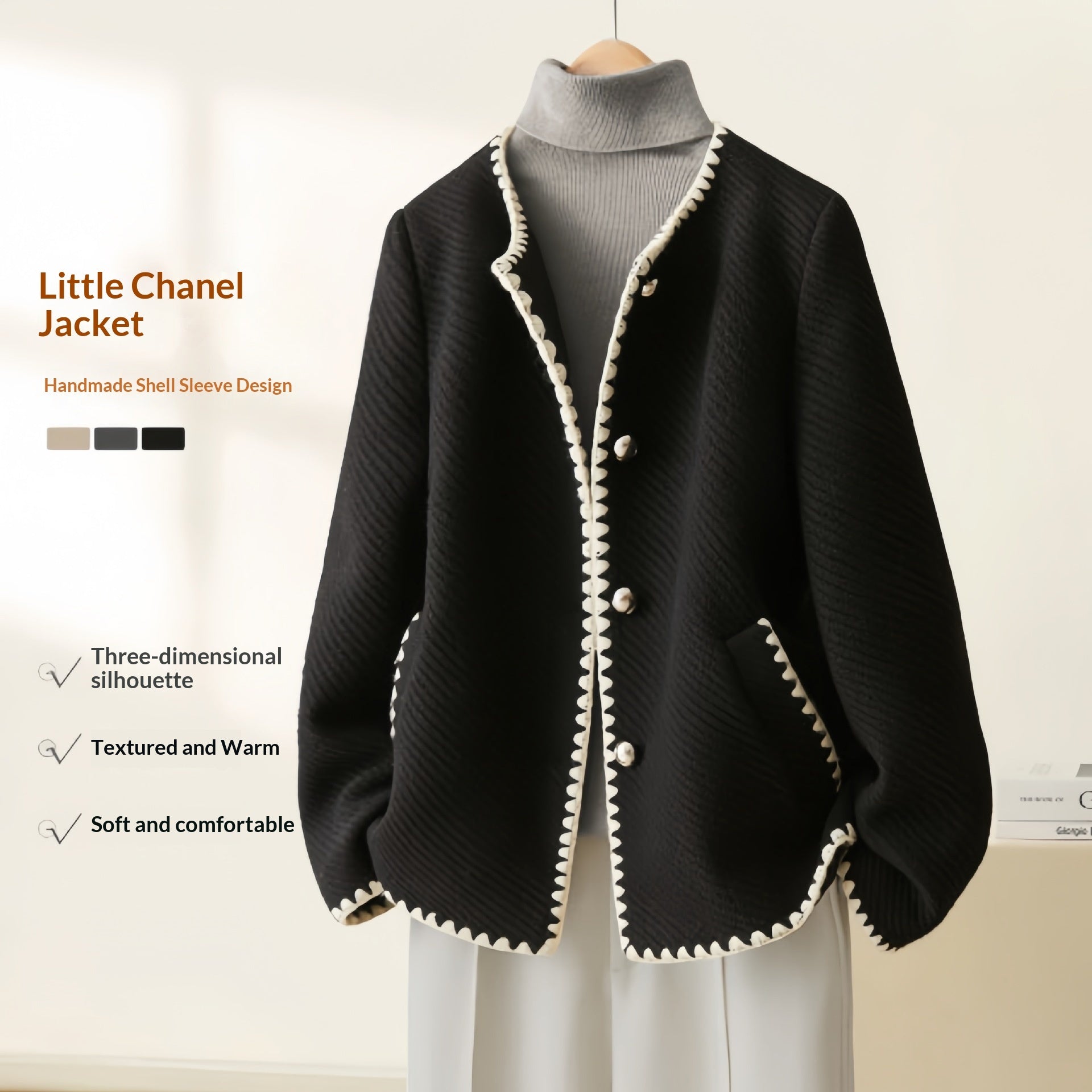 Manteau minimaliste luxueux en laine à manches coquille pour femme