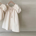 Robe fille - Manches bouffantes et nœud papillon